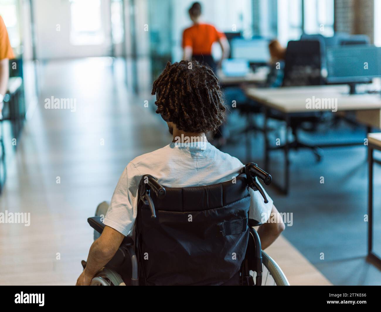 Wheelchair bound businessman hi-res stock photography and images - Alamy