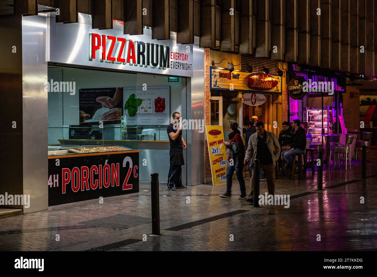 Nightime shot of a pizza shop  in Malaga, Andalucia, Spain Stock Photo