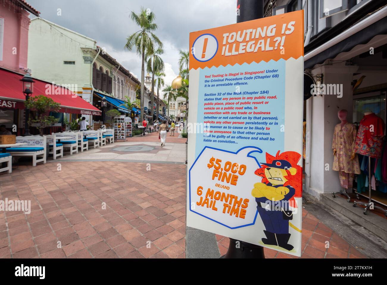 Colourful graphics poster signboard on the lamp post explains to the