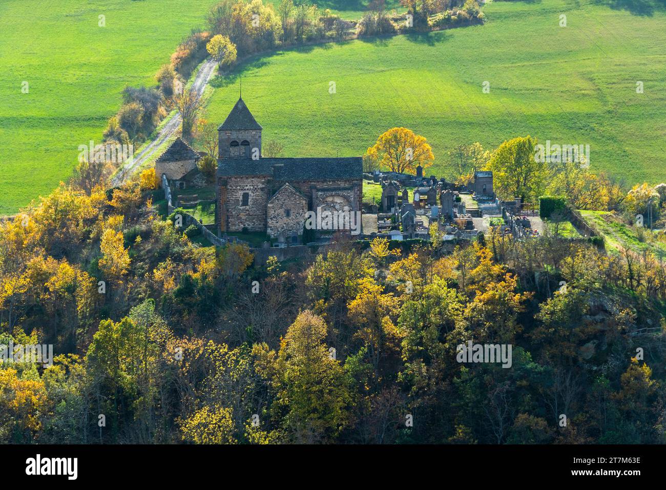 Romanesque church of Chastel in autumn, Saint Floret village labeled small city of character, Puy de Dome departement, Auvergne Rhones Alpes, France Stock Photo