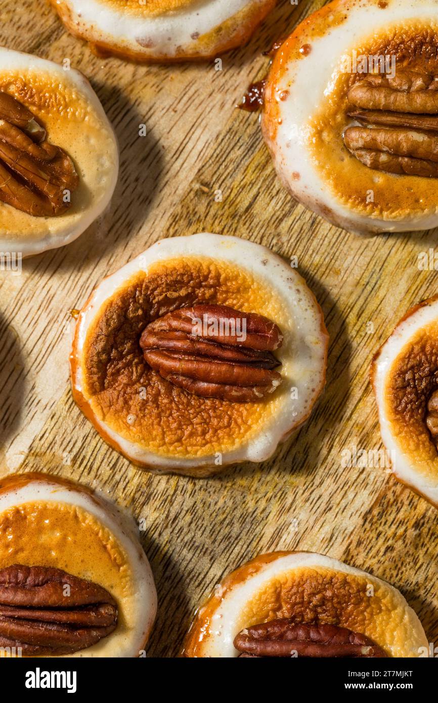 Homemade Sweet Potato Bites with Marshmallows and Pecans for Thanksgiving Stock Photo