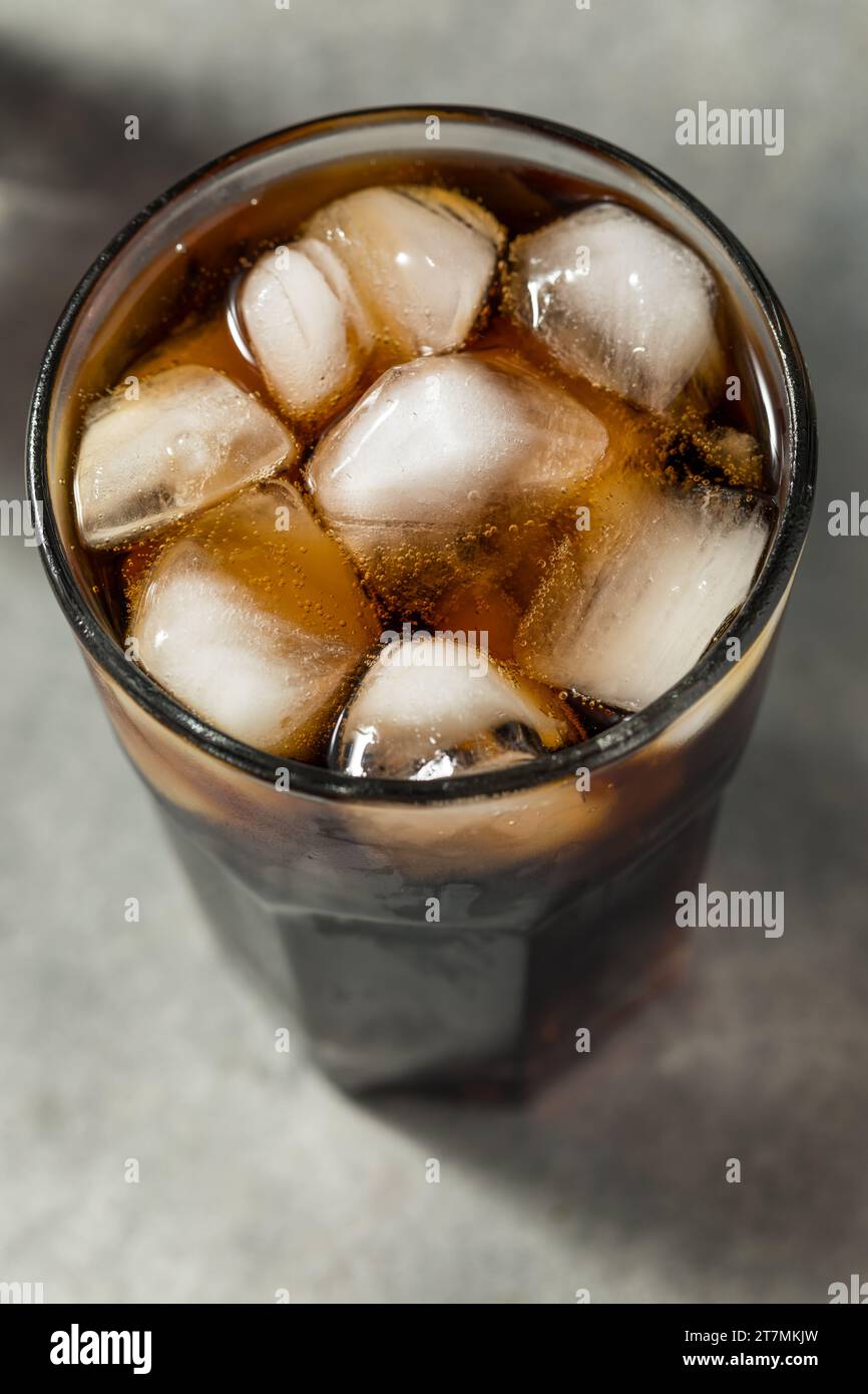 Cold Refreshing Dark Brown Cola with Ice Cubes Stock Photo