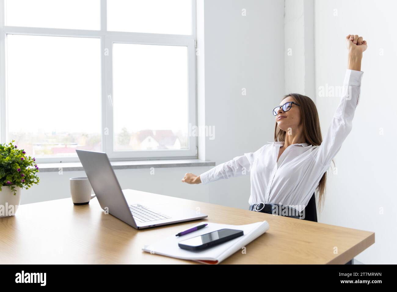 Happy excited young woman student or employee, office worker winner ...