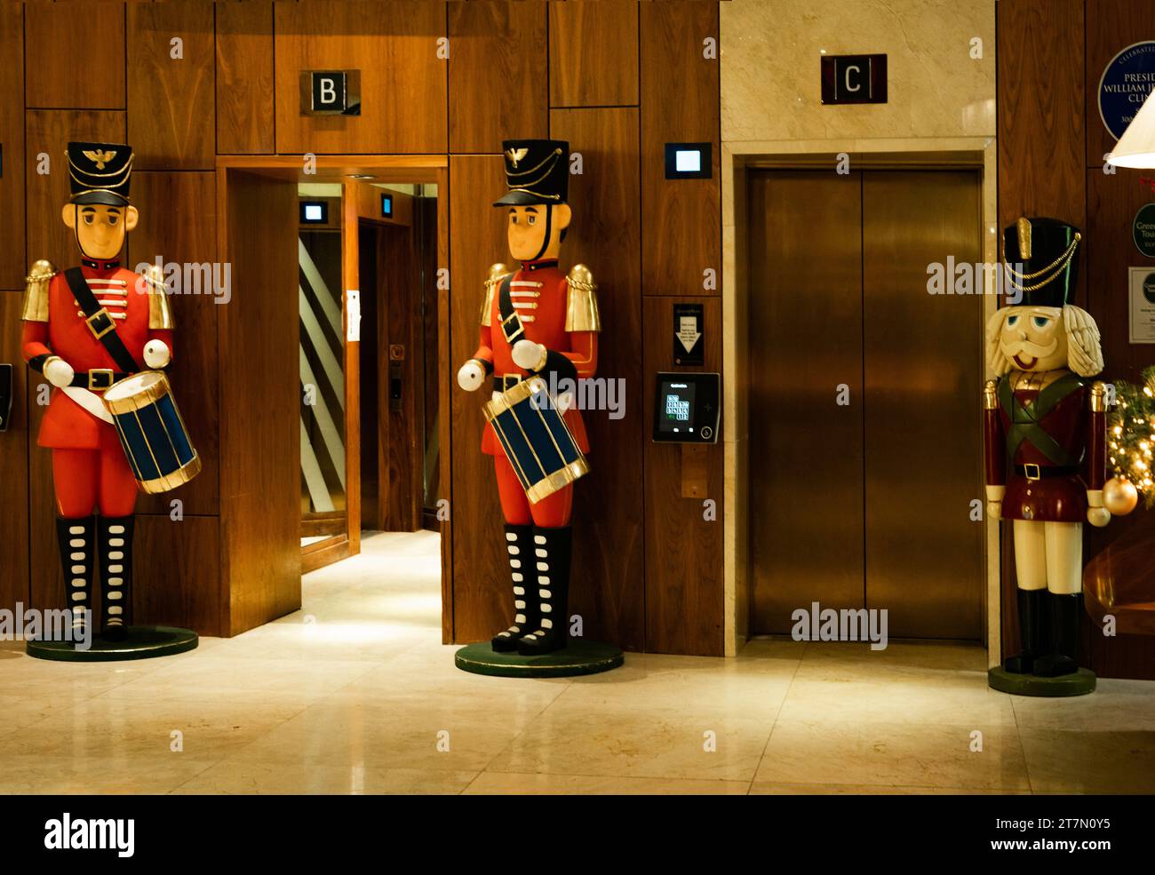Belfast, Northern Ireland, UK - December 12, 2022: Lobby of Europa Hotel, the most bombed hotel in the world, with giant nutcrackers by elevators duri Stock Photo