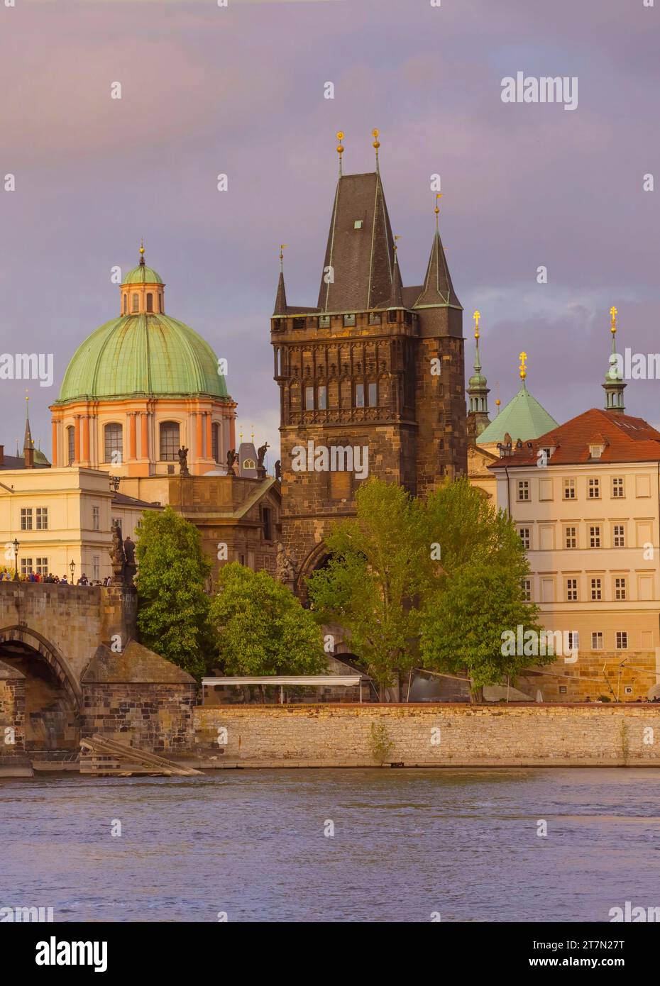 View of old town with Charles Bridge (Karluv Most) on Vltava river and Old Town Bridge Tower, famous tourist destination in Prague, Czech Republic Stock Photo