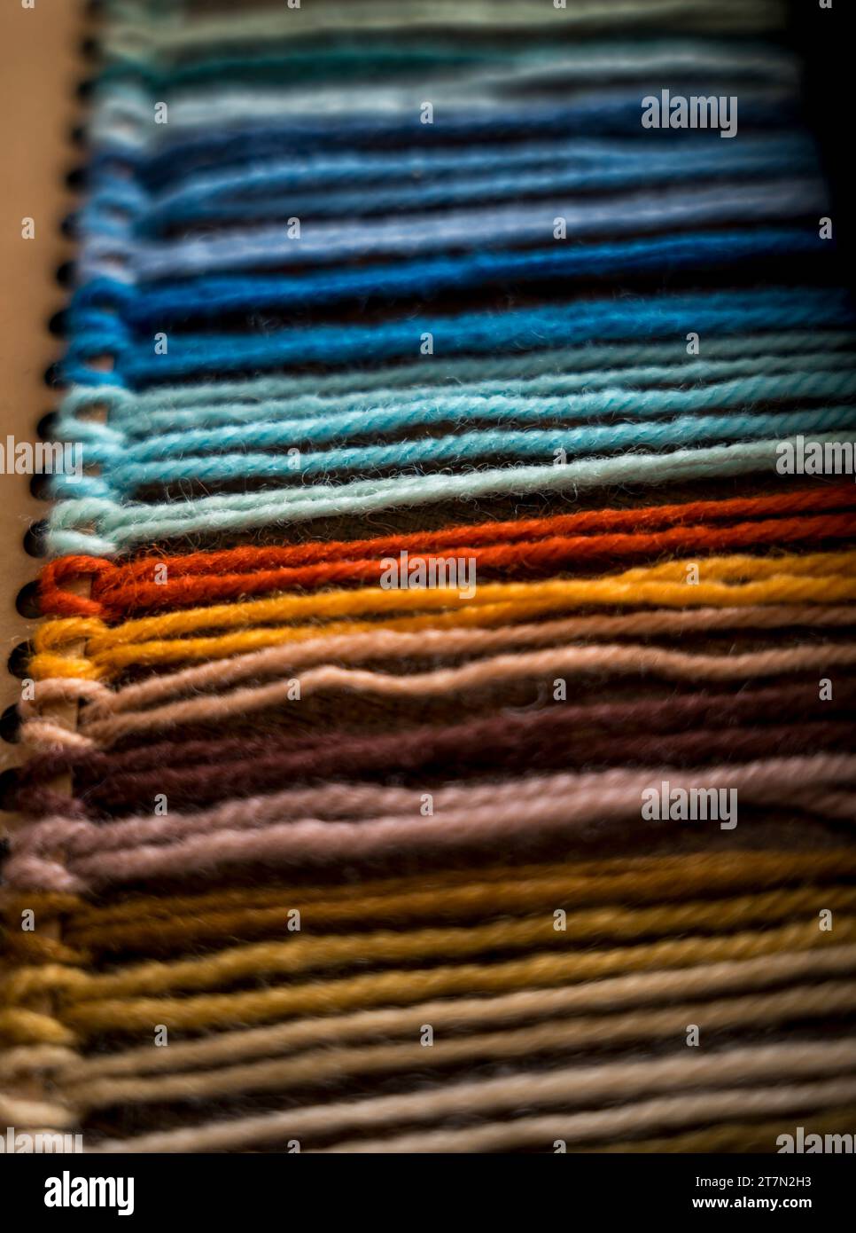 Close up of vibrant created from wool yarn in different colors Stock Photo