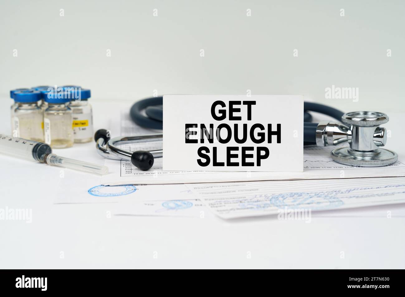 No Sleep Injection Medical concept. On the medical documents there is a stethoscope ...