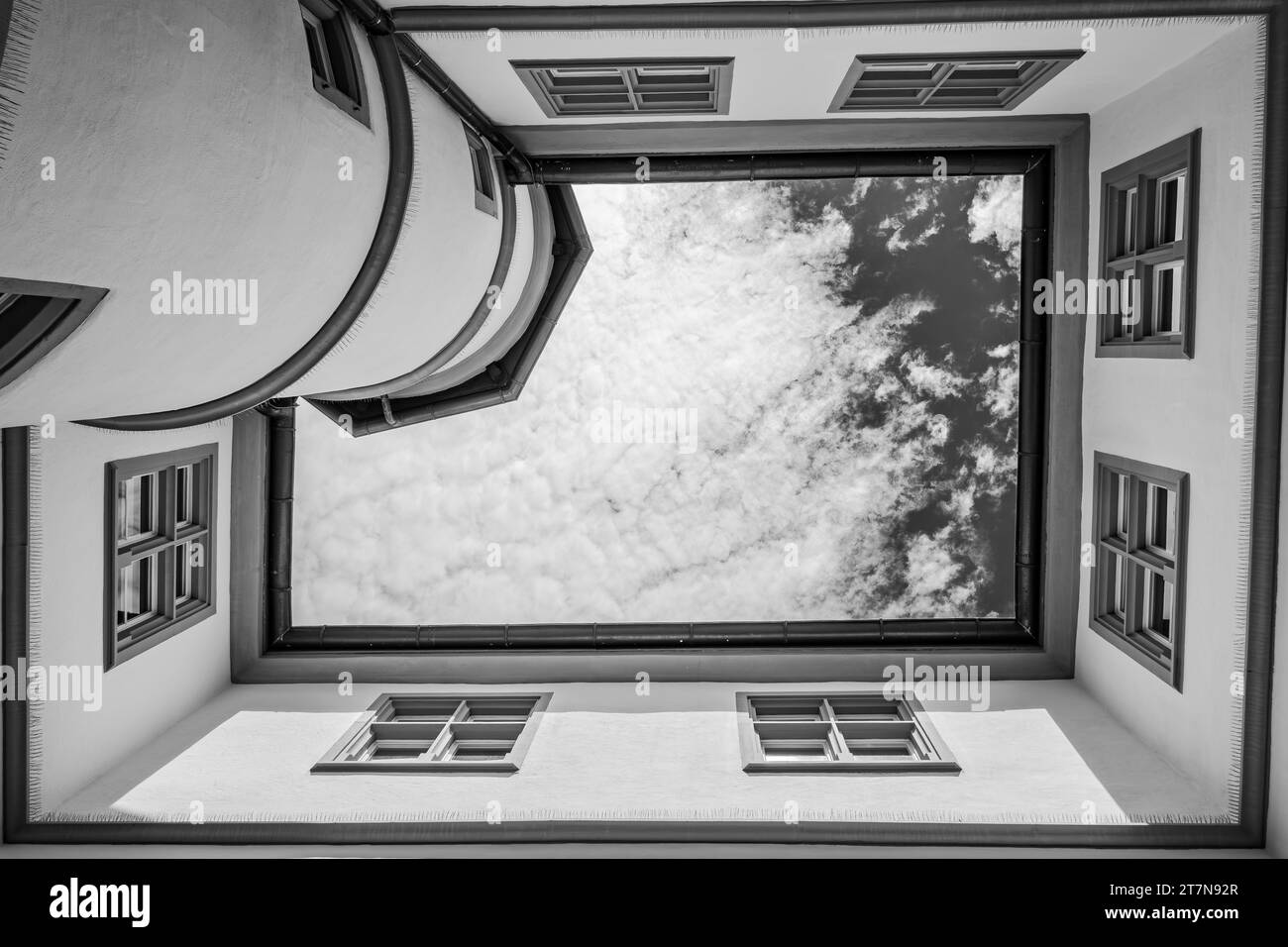 Courtyard square windows Black and White Stock Photos & Images - Alamy