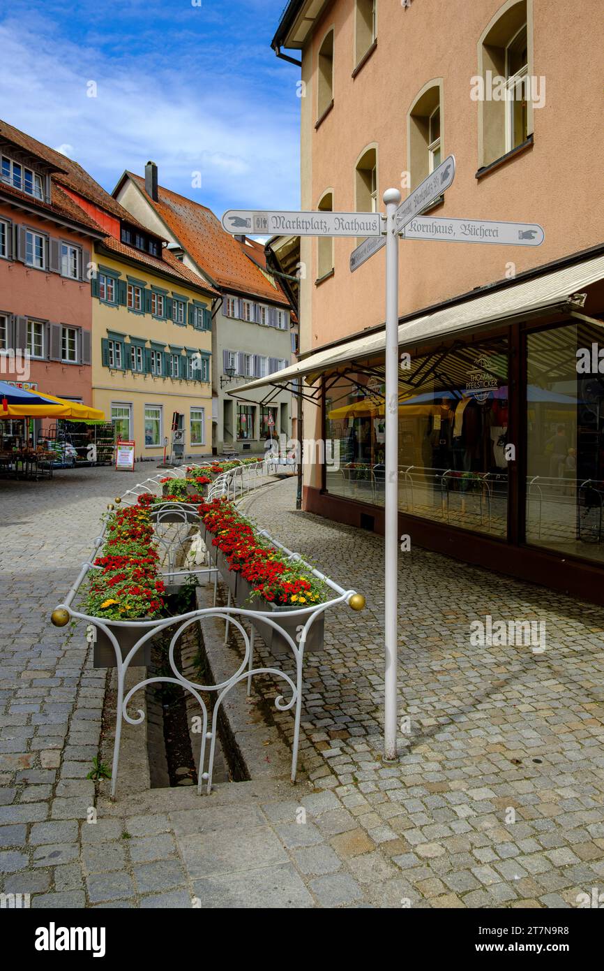 Town stream and floral decoration at Postplatz in the Lower Old Town of Wangen im Allgäu, Upper Swabia, Baden-Württemberg, Germany. Stock Photo