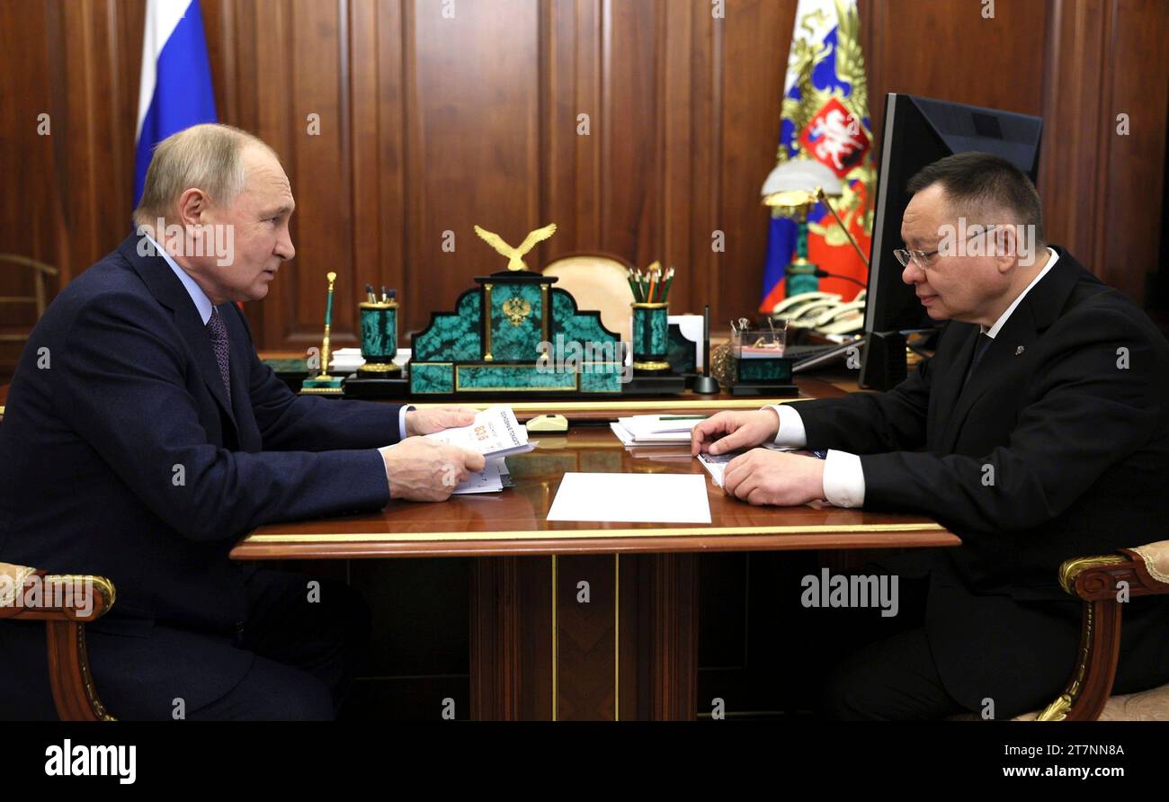 Credit: Gavriil Grigorov/Kremlin Pool/Alamy Live NewsMoscow, Russia. 14 November, 2023. Russian President Vladimir Putin, left, listens to Minister of Construction, Housing and Utilities Irek Fayzullin, right, during a face-to-face working meeting at the Kremlin, November 14, 2023 in Moscow, Russia. Stock Photo