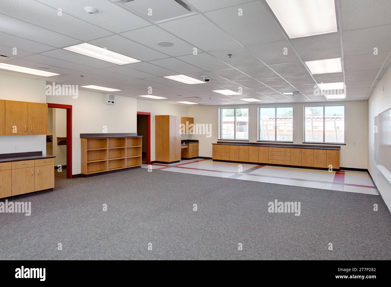Modern cabinets in a new elementary school.  The cabinets are designed for function and economy. Stock Photo