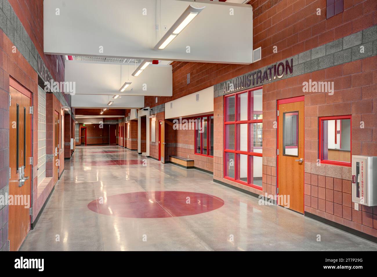 The main hallway in an elementary school, with money saving construction materials, and High efficency computer controlled LED light fixtures. Stock Photo