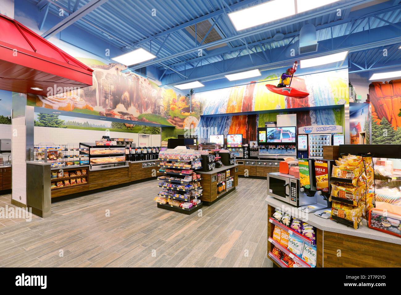 The interior of a new, modern Maverik branded convienience store with rows of merchandise, and a beverage bar Stock Photo