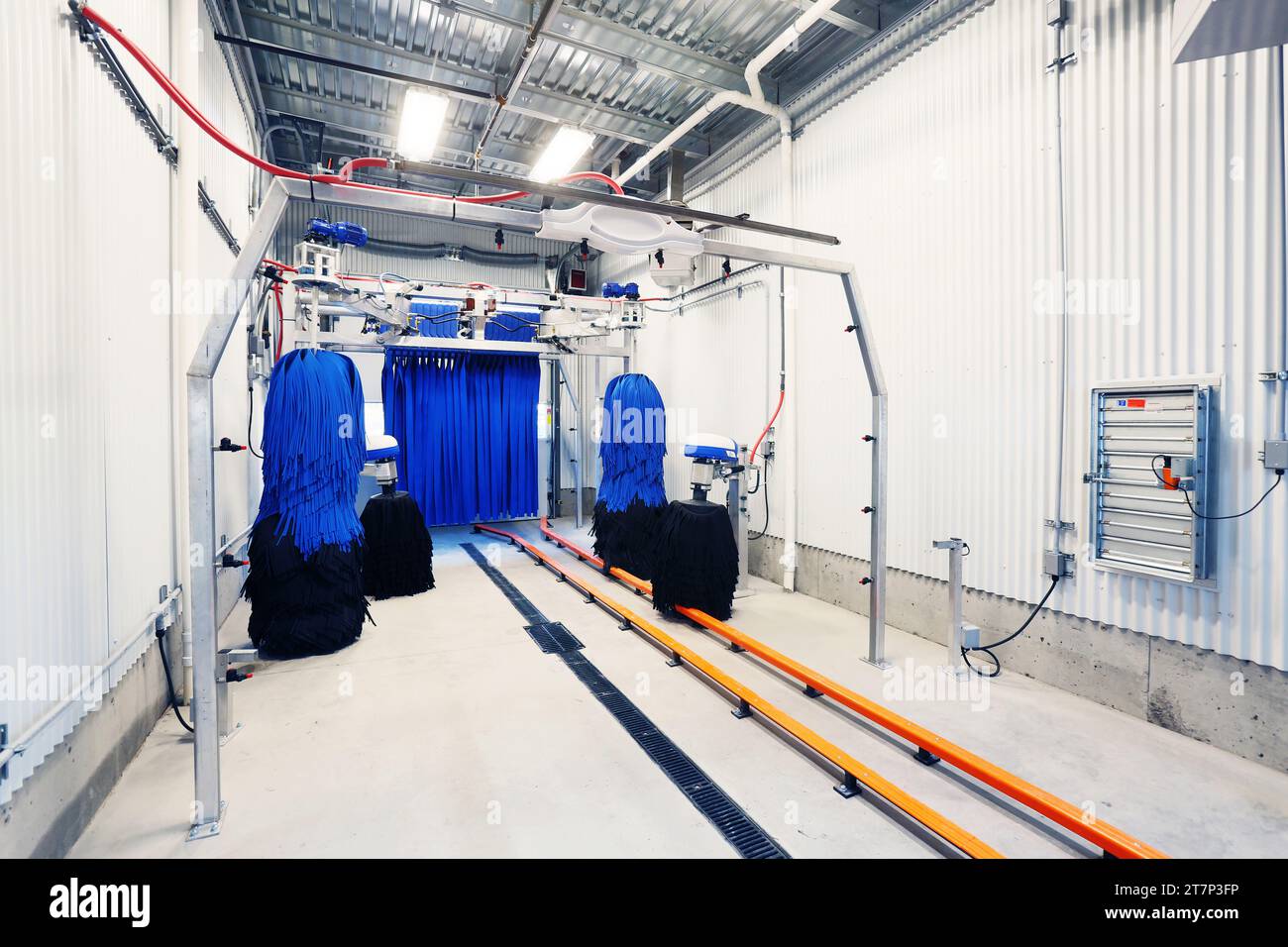 Brushes and a chamois wall inside the tunnel of a new modern automatic