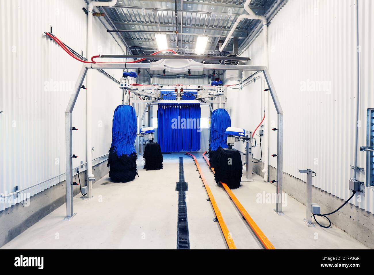 Brushes and a chamois wall inside the tunnel of a new modern automatic