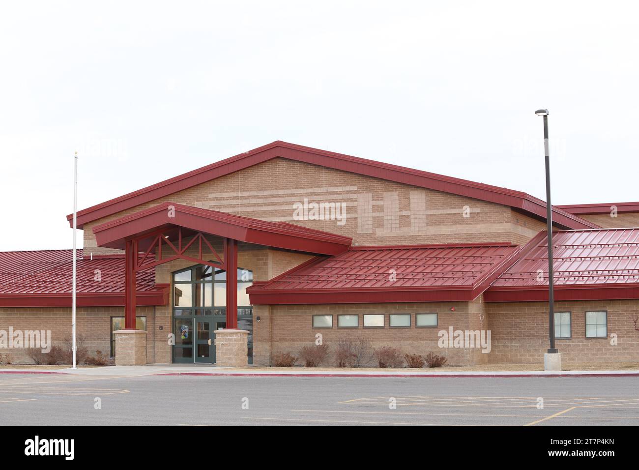 The exterior of the new Snake river elementary school in Rigby, Idaho showing the entry/exit doors, and modern facade. Stock Photo