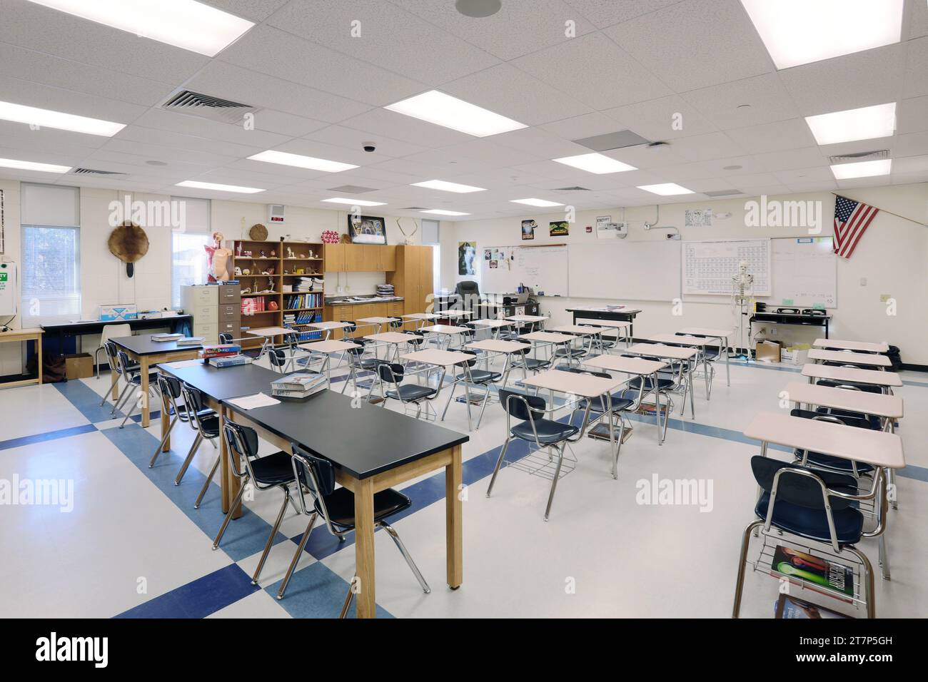 A science classroom with desks, tables, lab area, and biology models, in a new modern high school Stock Photo