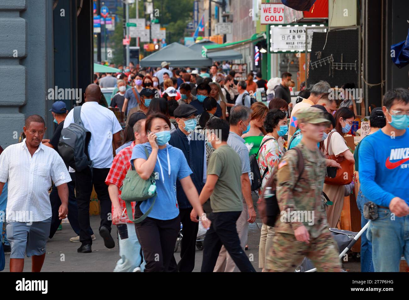 A diverse crowd of people, primarily Chinese, and Asian Americans, in Downtown Flushing, 法拉盛華埠, 華裔美國人, 紐約, New York City, September, 2022. Stock Photo