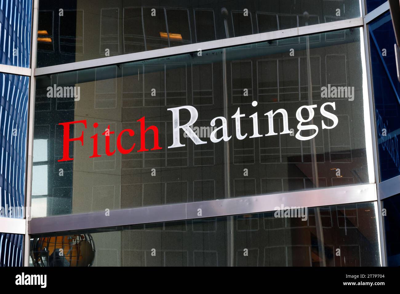 Window signage for Fitch Ratings, a credit rating agency, in Downtown Manhattan, New York City Stock Photo