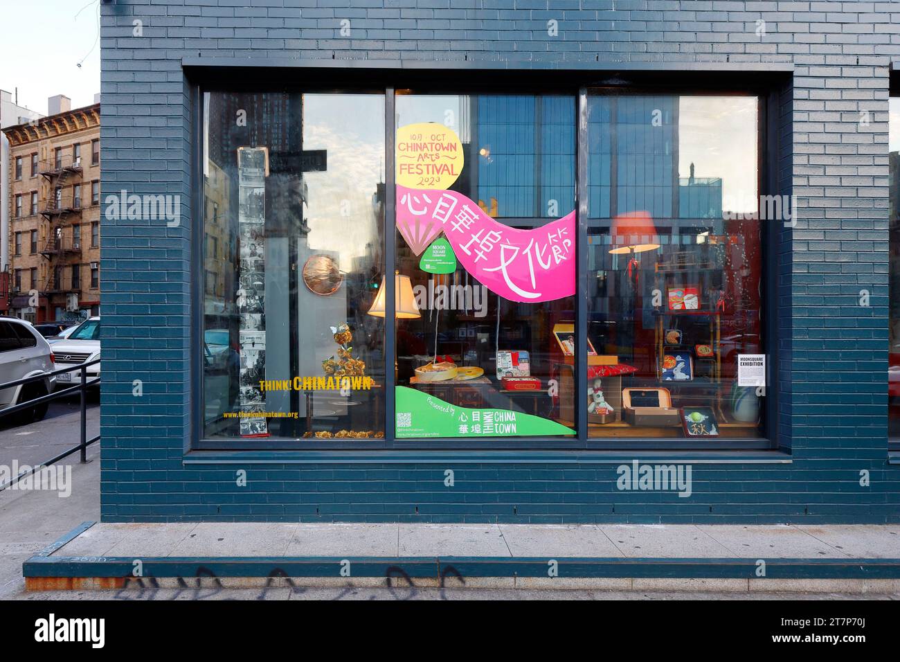 A window display at Think!Chinatown, a community organization and cultural space in Manhattan Chinatown at 1 Pike St. Stock Photo