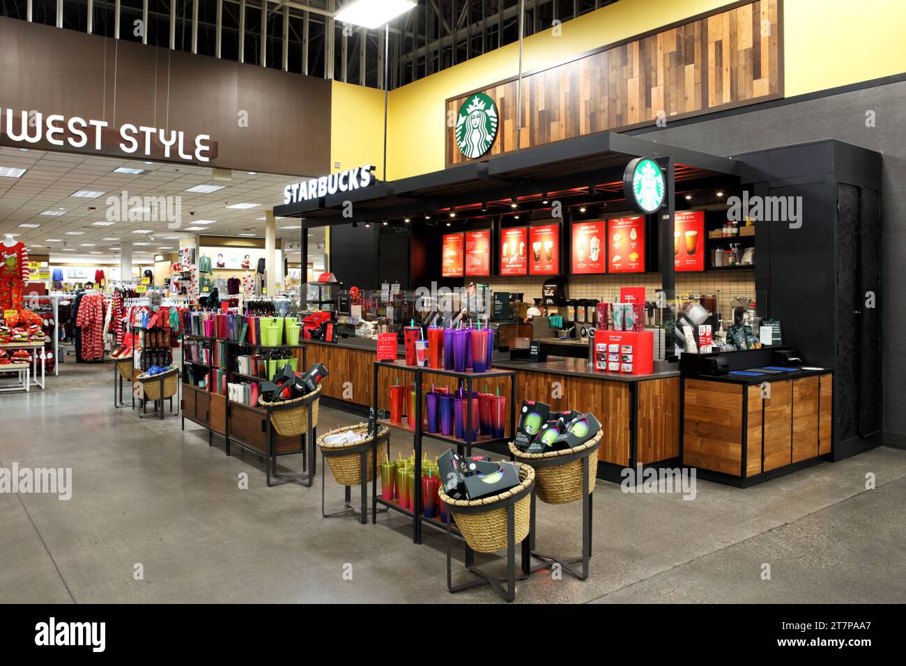 A Starbucks coffee shop inside a modern super store, or mega store. Stock Photo