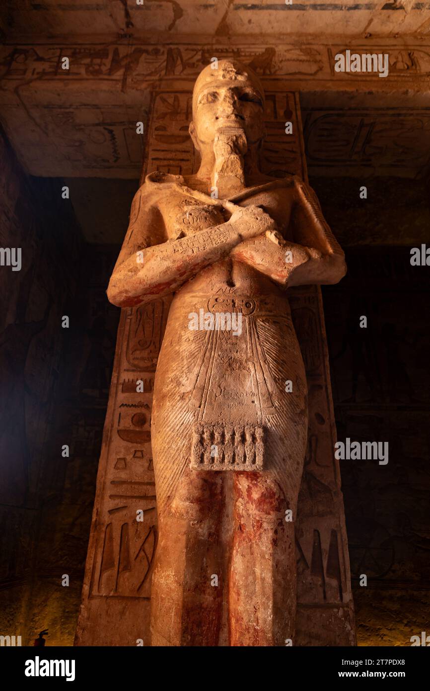 Large interior statues and hieroglyphics of Abu Simbel temple ancient