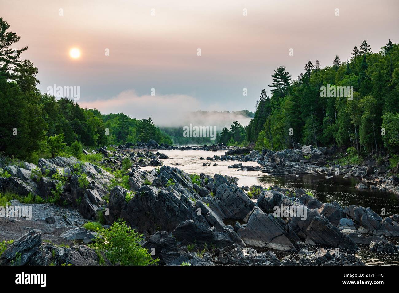 Sun Rises Over the St. Louis River in Jay Cooke State Park  in Minnesota Stock Photo