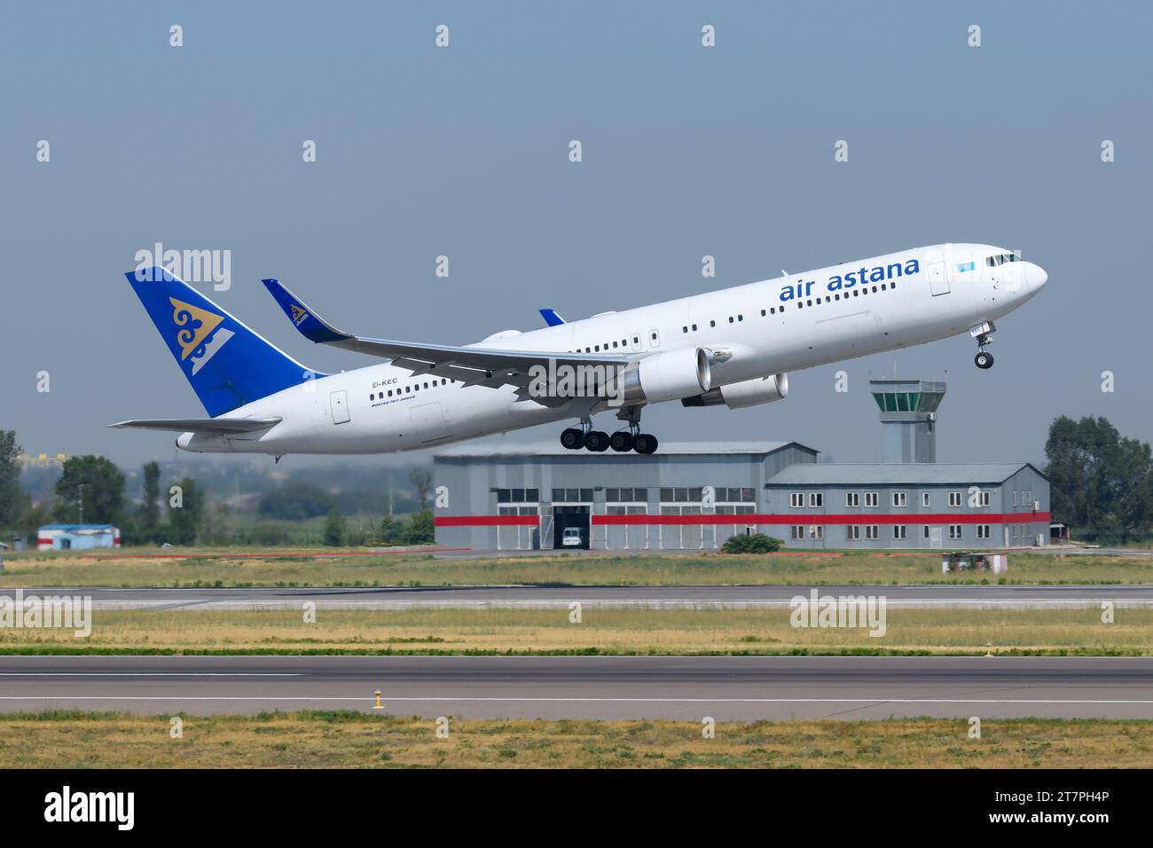 Air Astana Boeing 767 aircraft departing Almaty Airport. Plane 767 of AirAstana airline during take off. B767 airplane of Air Astana. Stock Photo