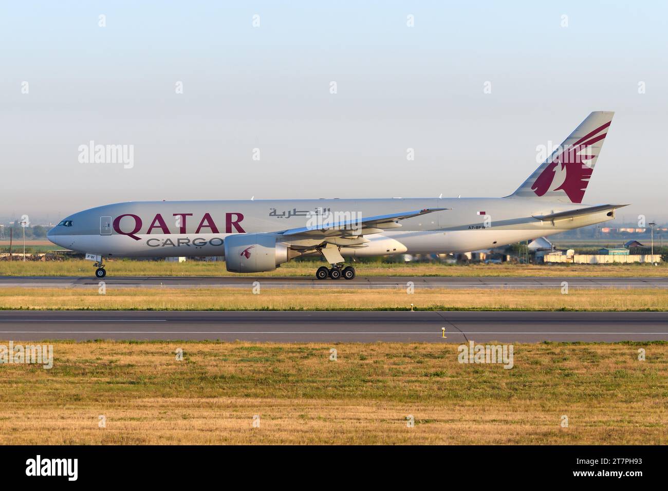 Qatar Cargo Boeing 777F aircraft taxiing. Airplane of model 777 for freigther transport of Qatar Cargo. Stock Photo