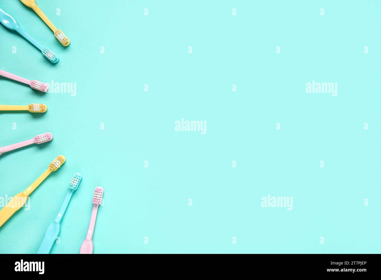 Colorful plastic toothbrushes on color background Stock Photo - Alamy