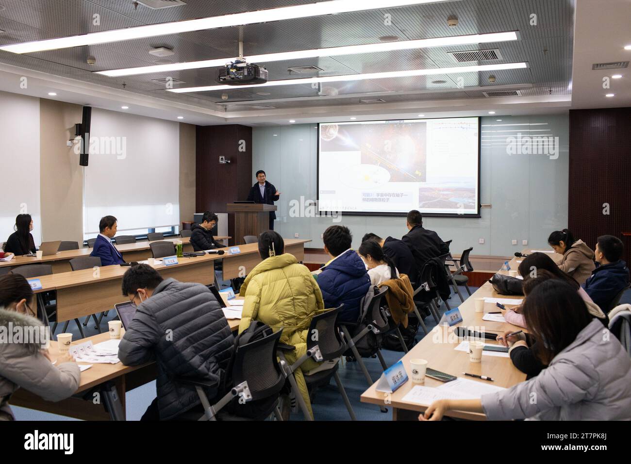 (231117) -- BEIJING, Nov. 17, 2023 (Xinhua) -- Chen Songzhan, the corresponding author of the study and a researcher at the Institute of High Energy Physics (IHEP) of the Chinese Academy of Sciences, introduces research findings at the IHEP of the Chinese Academy of Sciences in Beijing, capital of China, on Nov. 14, 2023. China's Large High Altitude Air Shower Observatory (LHAASO), a high-altitude cosmic ray observatory, has released the precise energy spectrum for the highest-energy gamma-ray radiation from the brightest gamma-ray burst (GRB) observed to date. The study, conducted by the LH Stock Photo