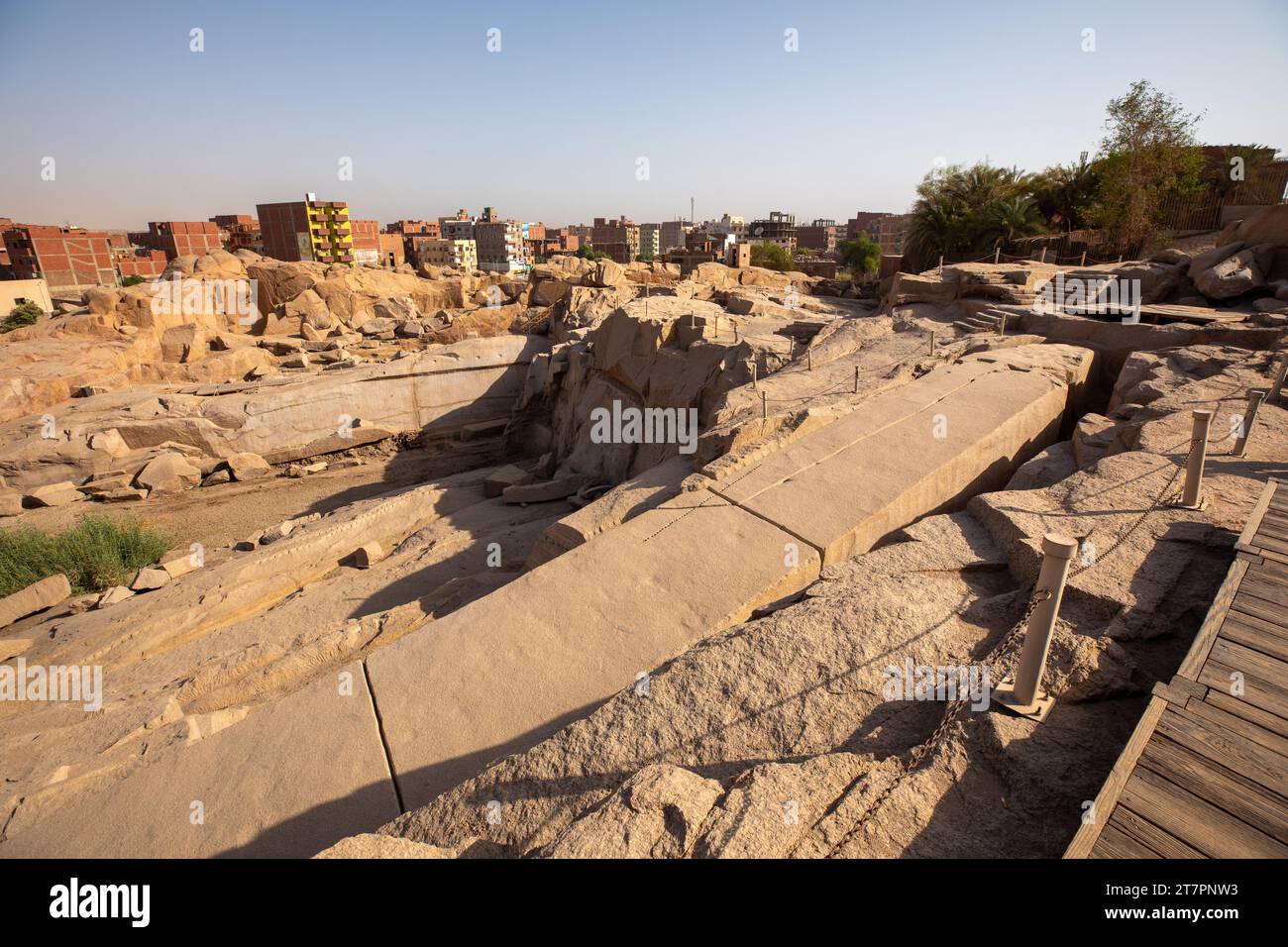 Giant unfinished obelisk being carved out of stone in ancient Egyptian quarry Stock Photo