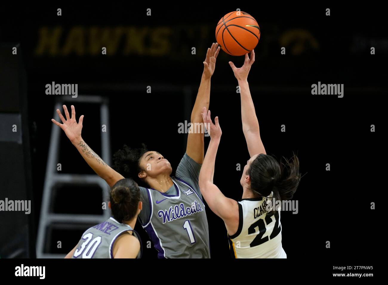 Kansas State guard Zyanna Walker (1) blocks a shot by Iowa guard
