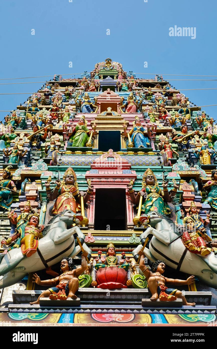 Ornare South Indian-style Raja Gopuram tower at Sri Mahamariamman Temple on a sunny day with clear blue skies - Jalan Bandar, Kuala Lumpur Chinatown Stock Photo