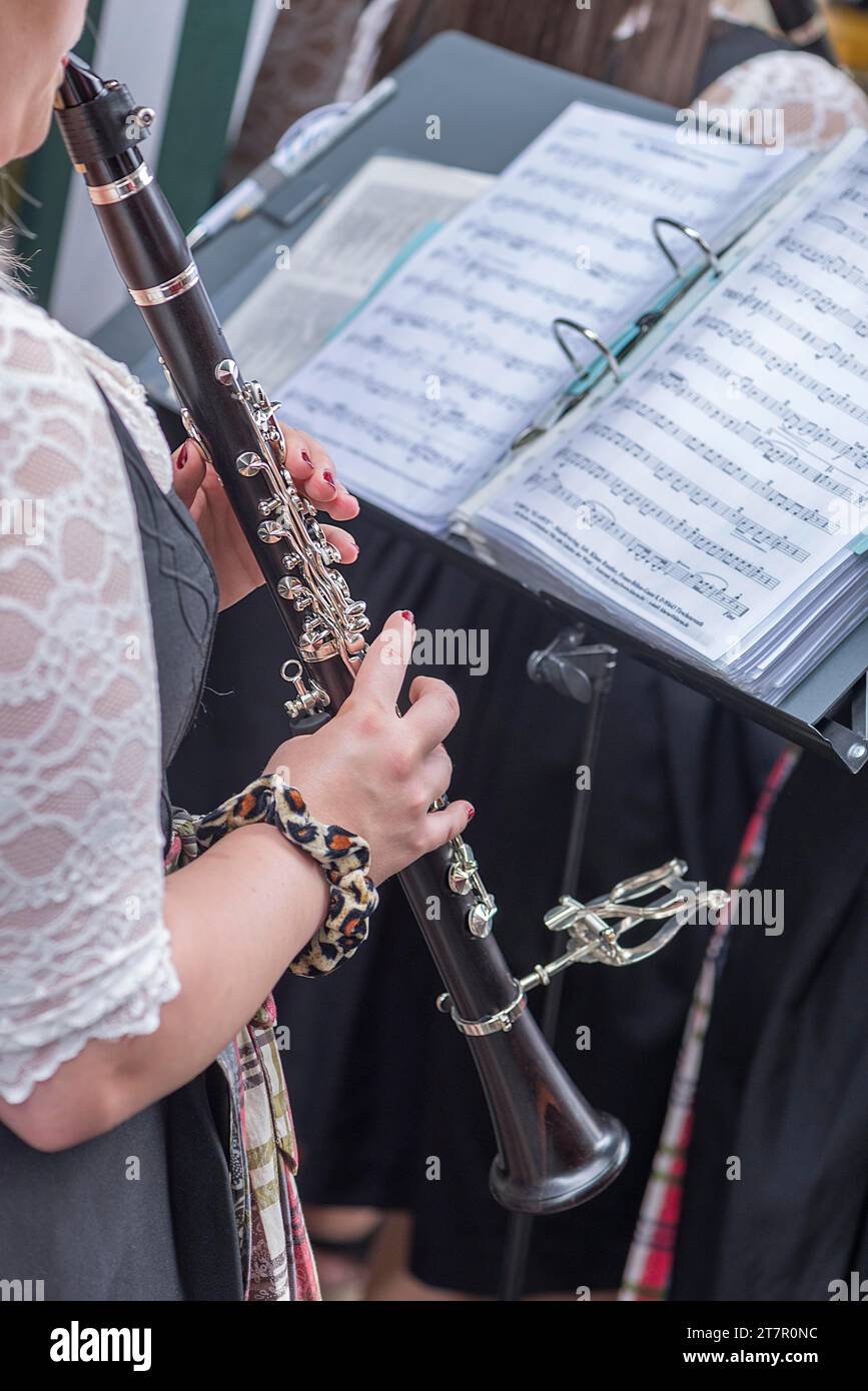 Musician with clarinet and sheet music plays for dancing at the traditional Tanzlindenfest in Limmersdorf, Upper Franconia, Bavaria, Germany Stock Photo