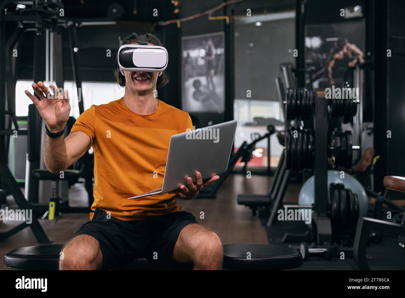 Sport male using VR headset advance visual technology practise learning body fitness Stock Photo