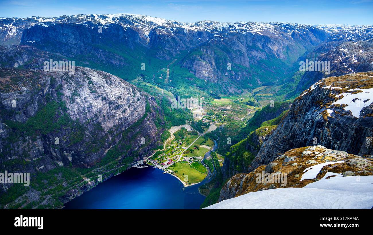 View from the steep cliff to Lyseboth norvegian village located at the end of Lysefjord, Stock Photo