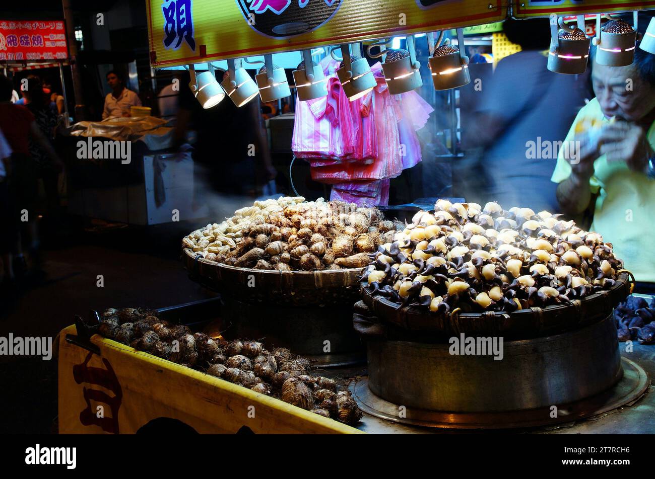 Taiwan night market snacks hot water Caltrop and small Taro Stock Photo