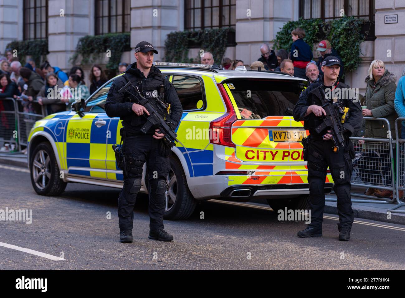 Authorised Firearms Officers on duty on Armistice Day in the City of London before the Lord Mayor's Show parade. Public gathering for outdoor event Stock Photo