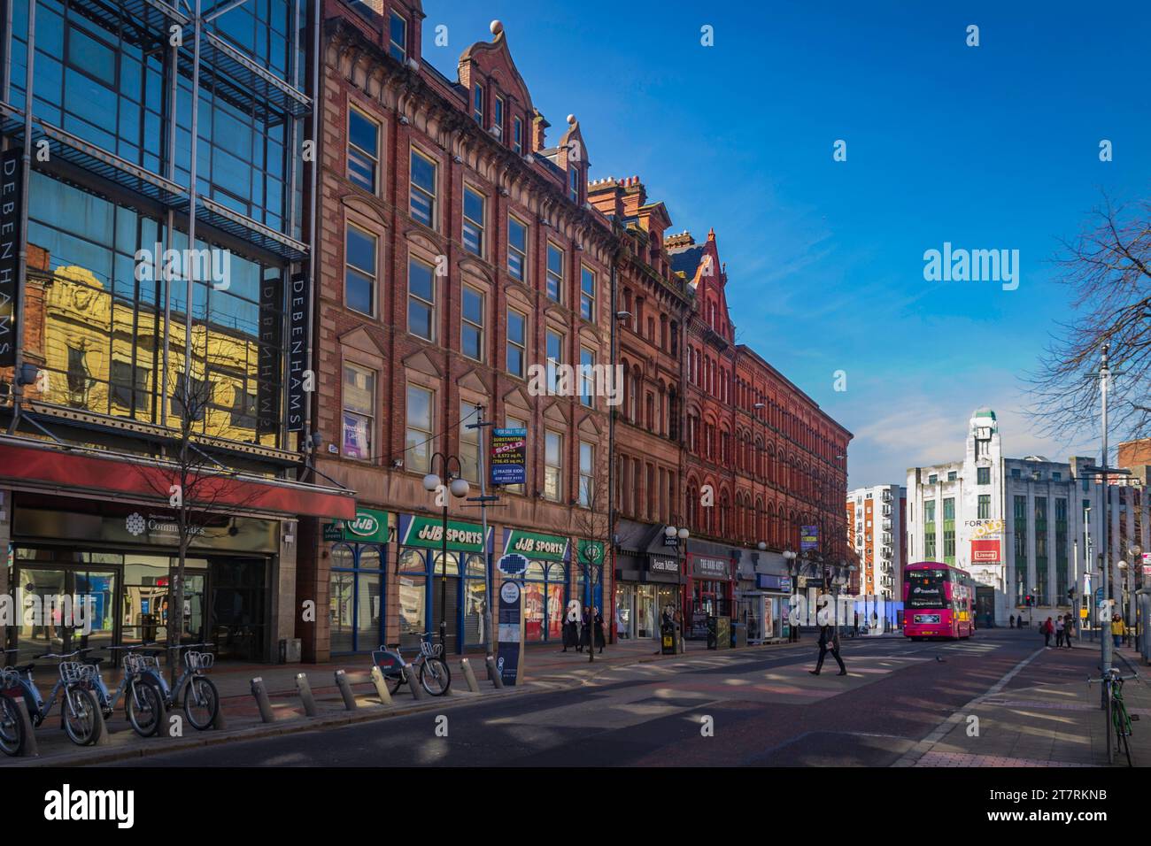 Belfast, County Antrim, Northern Ireland, March 20 2018 - Royal Avenue looking towards the Bank of Ireland building with Belfast Bikes in the foreground Stock Photo