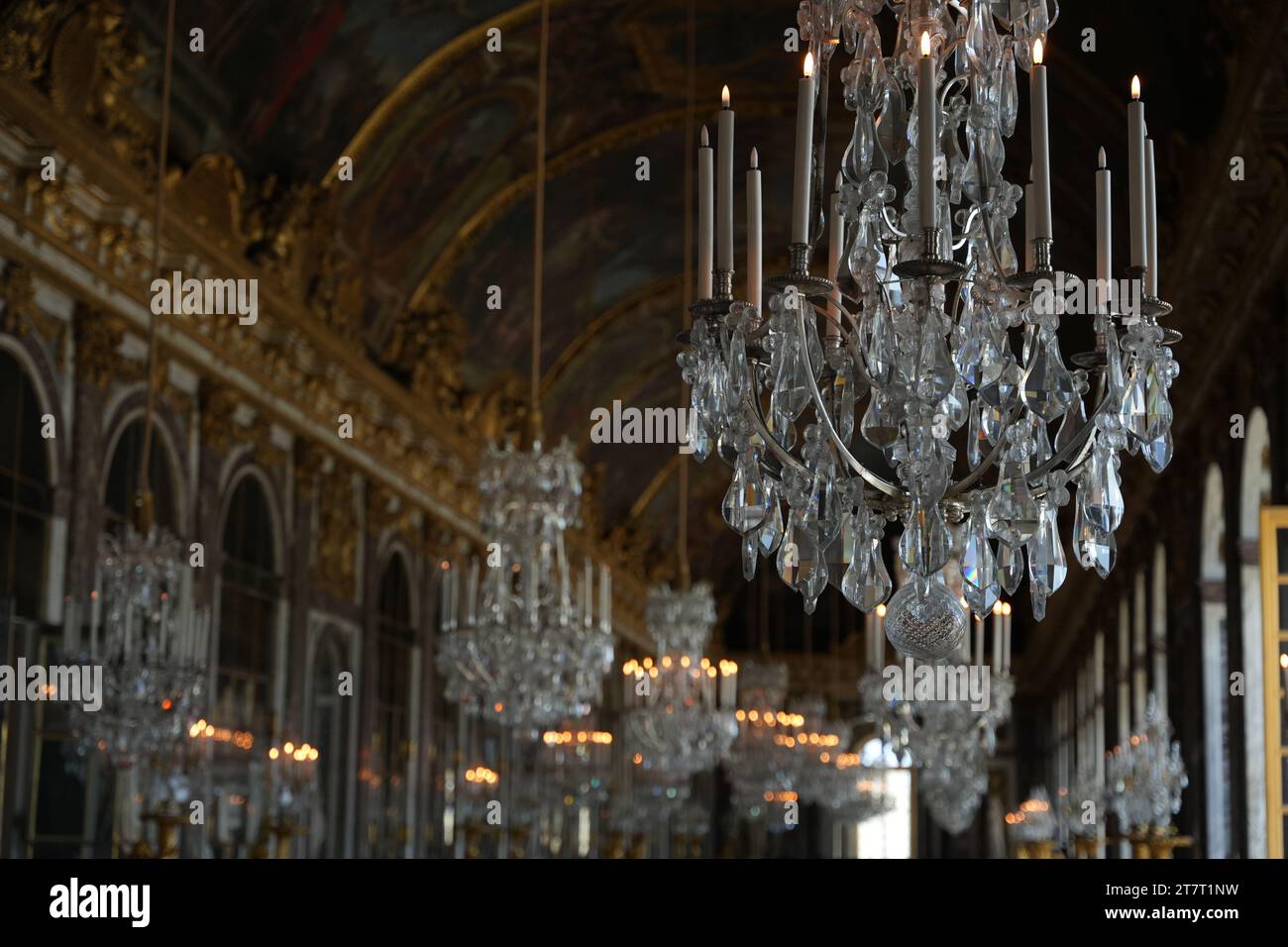 Versailles, France, 29.07.2023: Chandelier in mirror room of Versailles Stock Photo