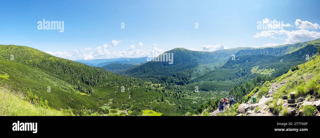 A group of tourists in the mountains. A beautiful view of the Uk Stock Photo