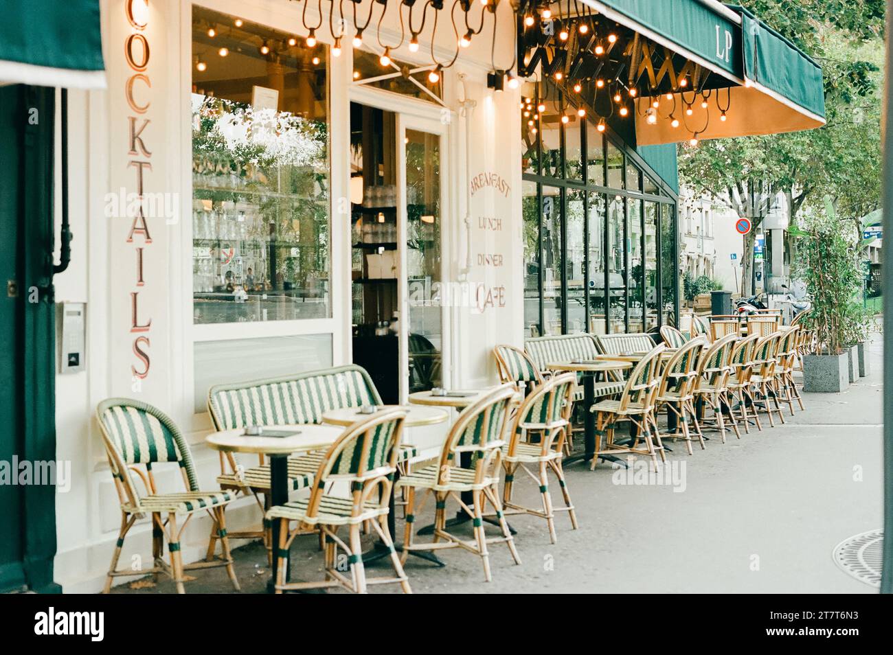 Paris cafe with green awning and beautiful lights Stock Photo