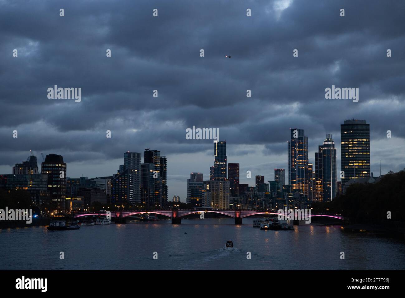 A moody sky with formations of dark clouds sits above the skyline over tower blocks and skyscrapers in Vauxhall and Nine Elms area, central London, UK Stock Photo