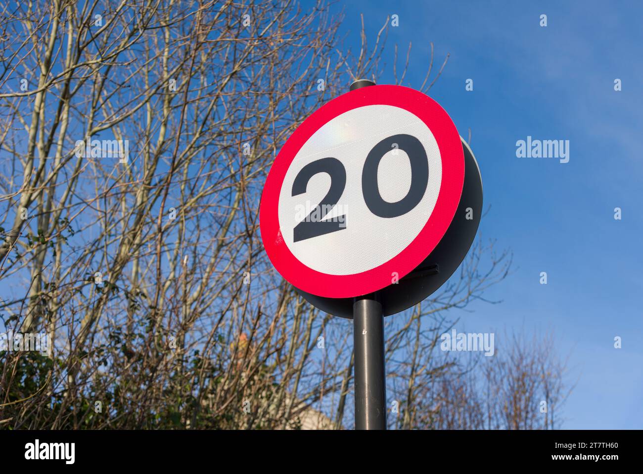 A 20 miles per hour speed limit sign on a country lane in North Somerset, England. Stock Photo