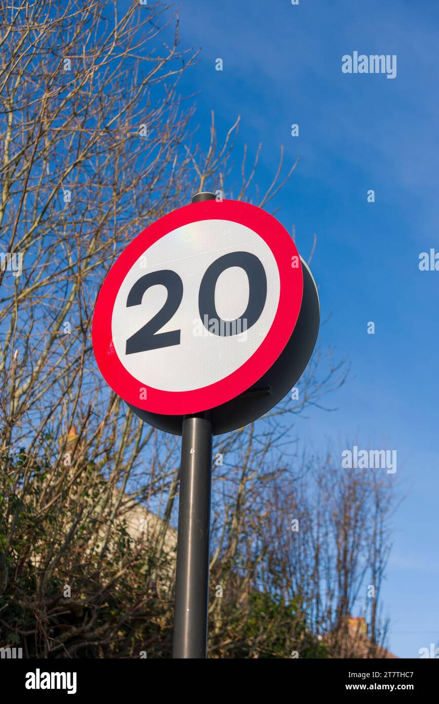 A 20 miles per hour speed limit sign on a country lane in North Somerset, England. Stock Photo