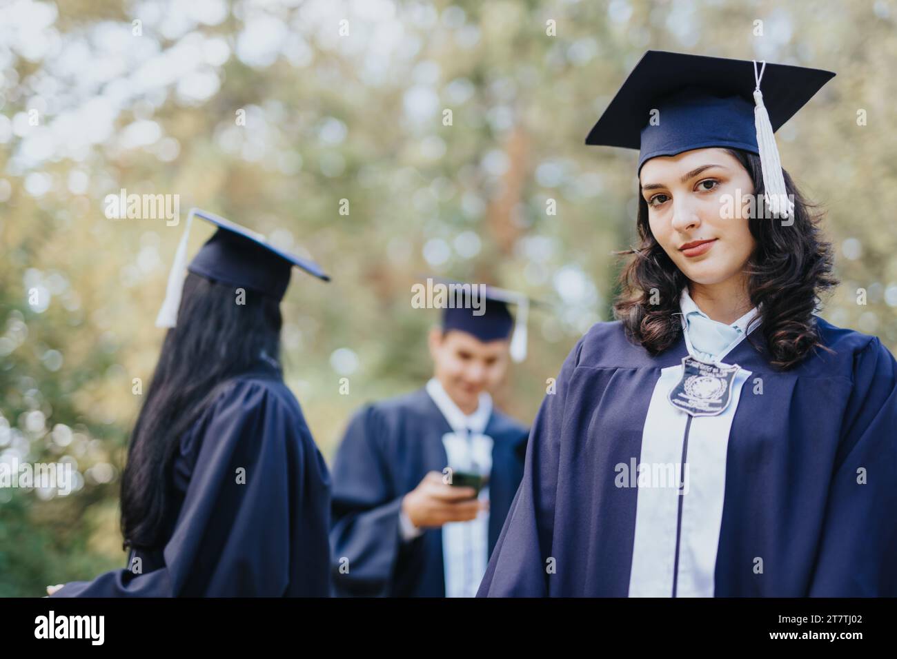 Portrait happy graduated students looking hi-res stock photography and ...