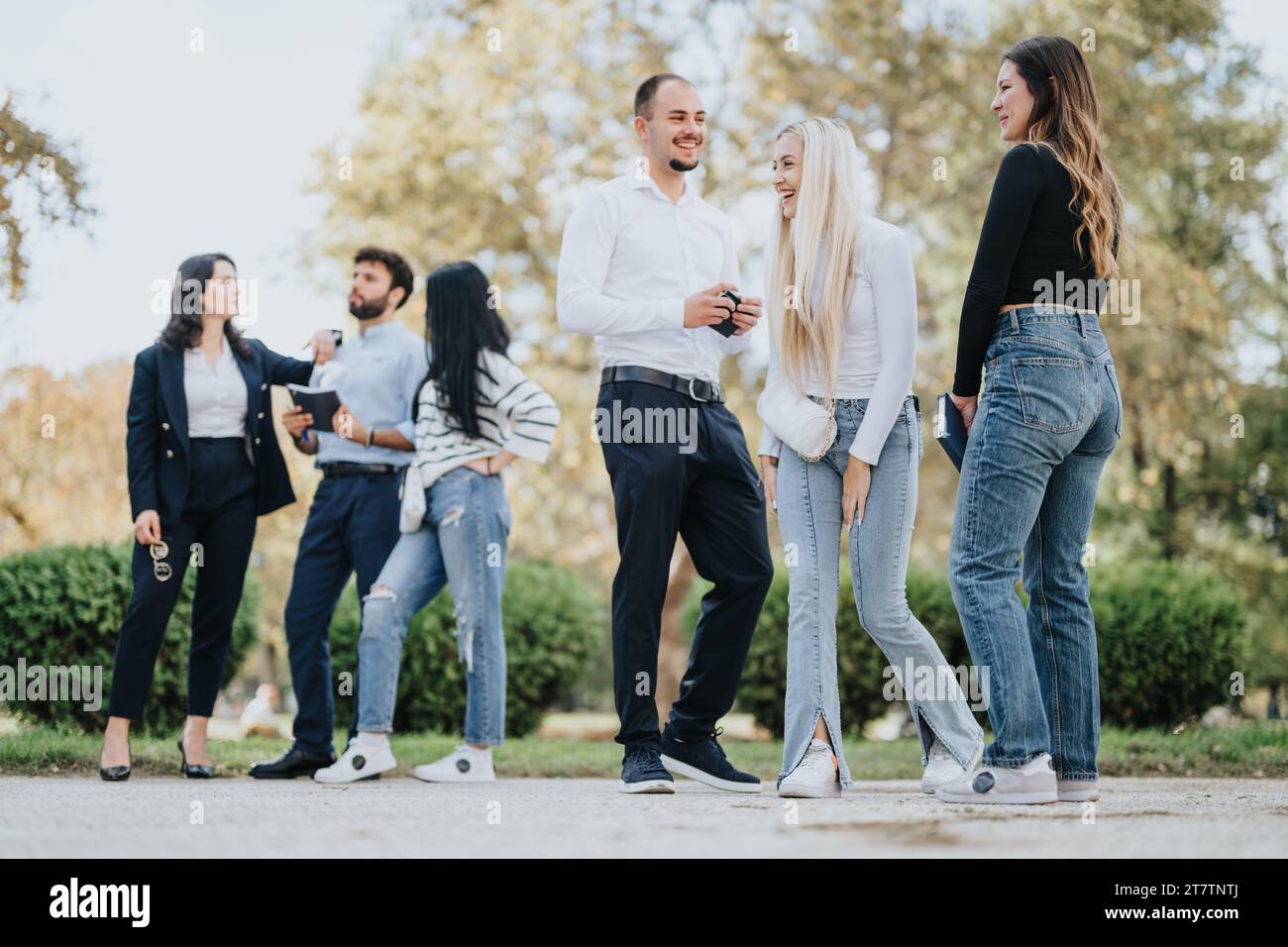Students Collaborating on a University Project Outdoors Stock Photo