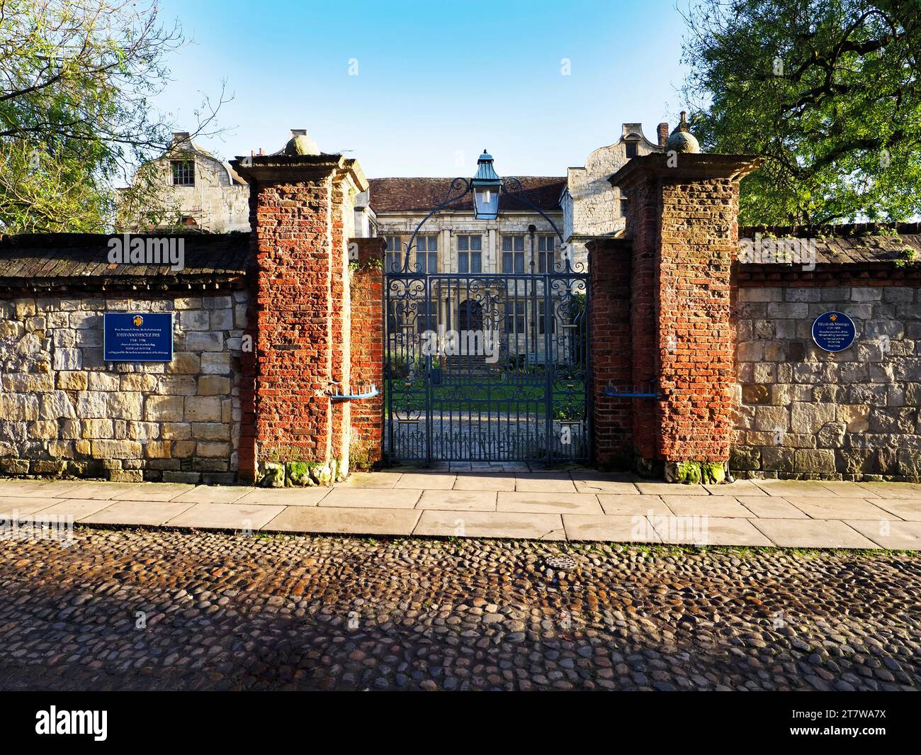 Gate piers and gate to the Treasurers House on Minster Yard in the City of York Yorkshire England Stock Photo