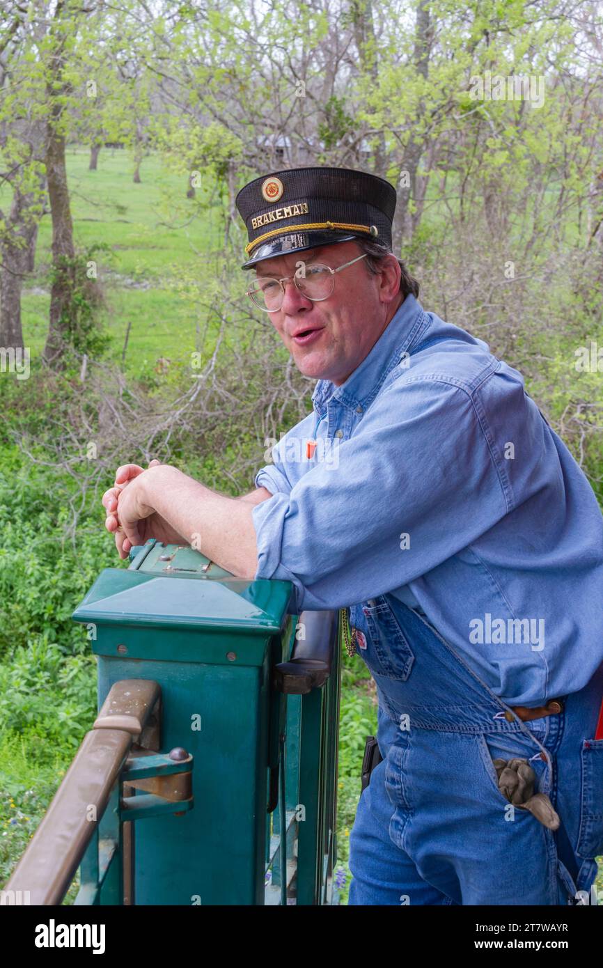 Railroad employee, serving as both conductor and brakeman on Hill